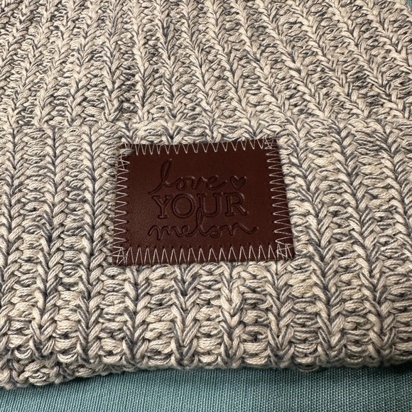 Light gray and white Love Your Melon cuffed beanie with brown patch - Picture 3 of 6